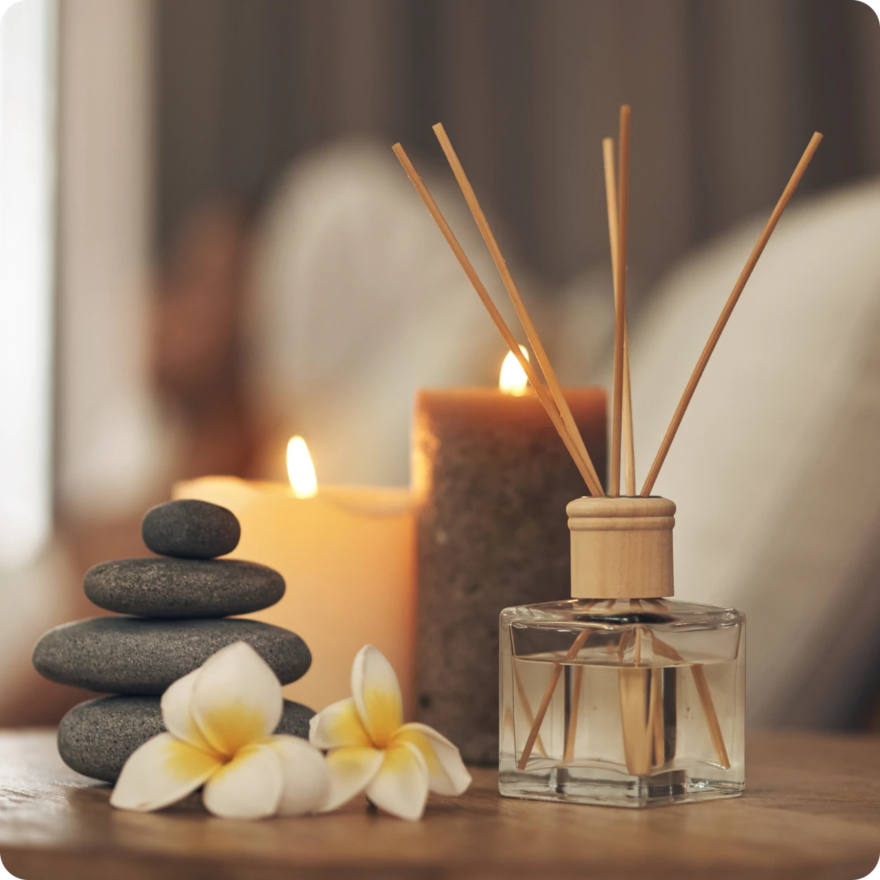 Aromatherapy scene with stones and flowers
